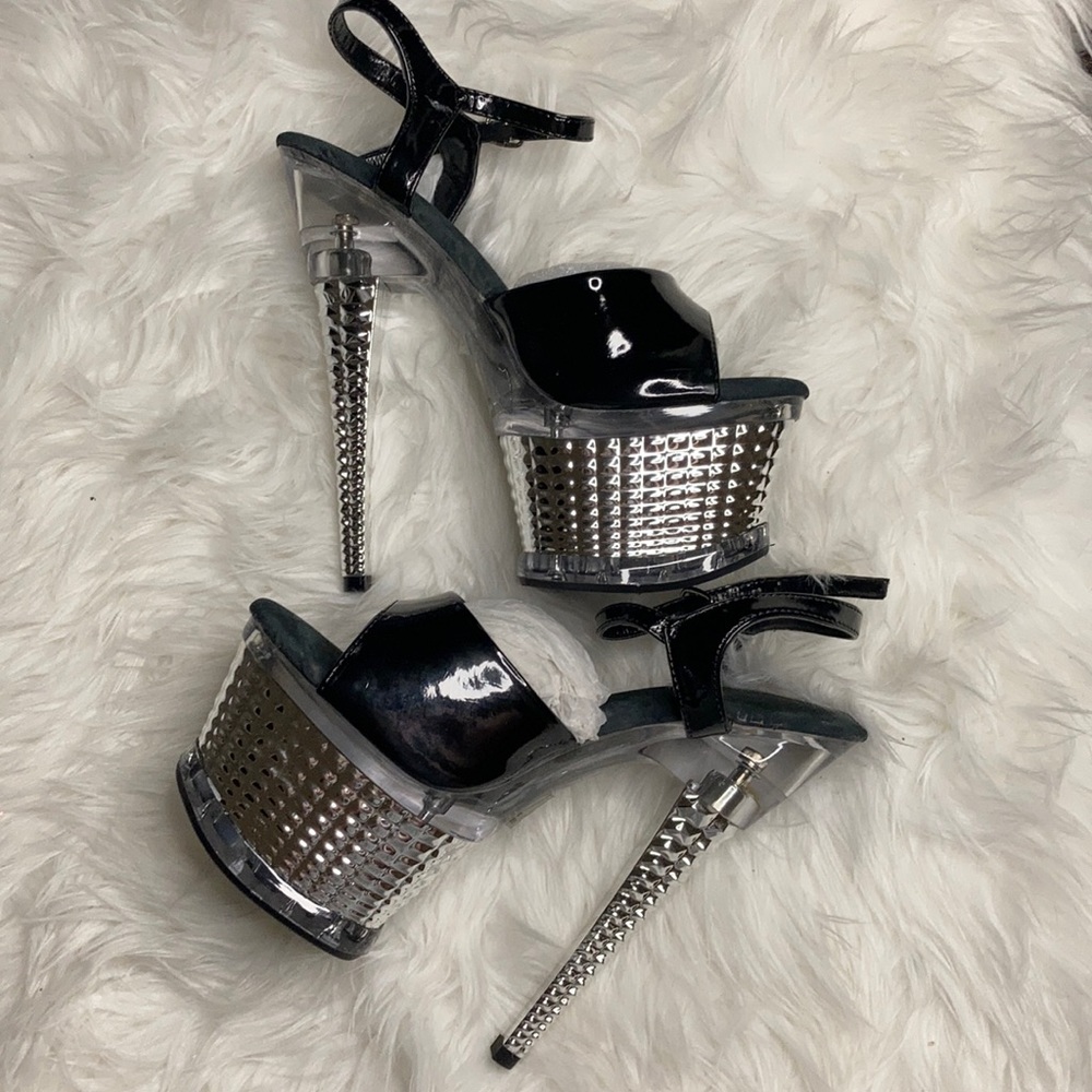 Chrome and black stripper heels